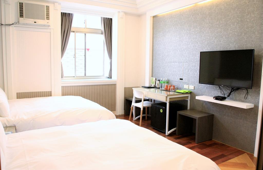Guest Motel-Zhubei Bagian luar foto