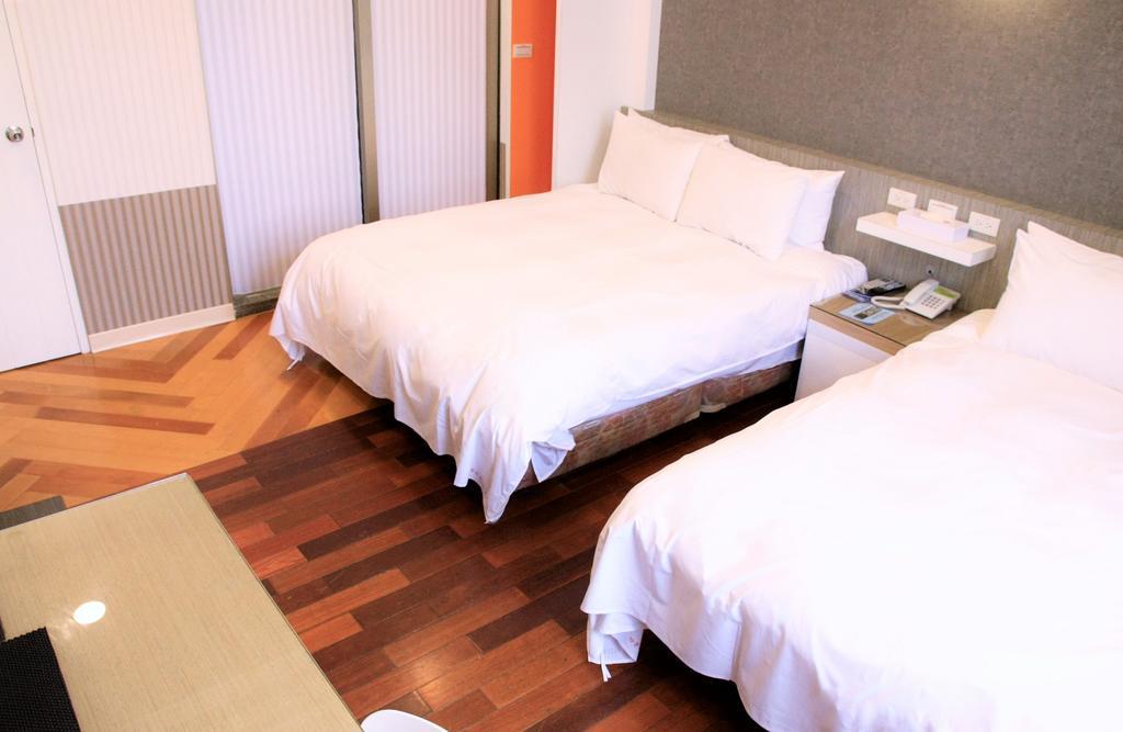 Guest Motel-Zhubei Bagian luar foto