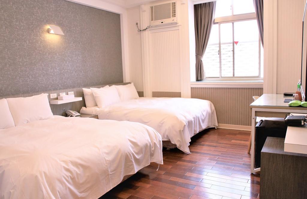 Guest Motel-Zhubei Bagian luar foto